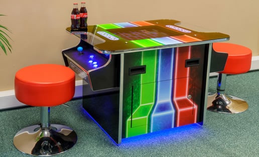 A man cave office Pac-Man arcade machine