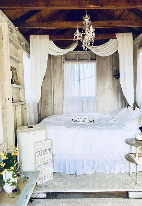 Rustic chic shed bedroom