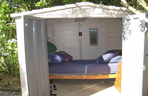 Small she shed bedroom